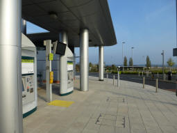 Looking towards an electric car charging facility from near the buffers