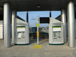 The platforms from beyond the buffers. The display lists tram and bus departures