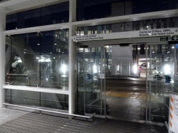 Looking out to the tram stop (off to the left) from by the lift to the station concourse
